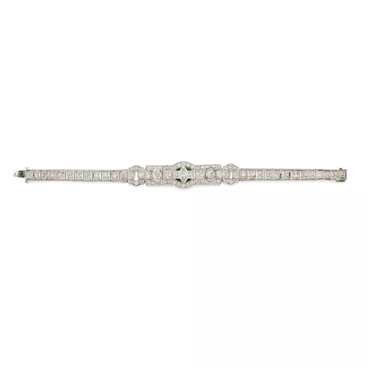 Lotto 509: Bracciale in oro bianco 18k, diamanti e smeraldi, 1920 circa